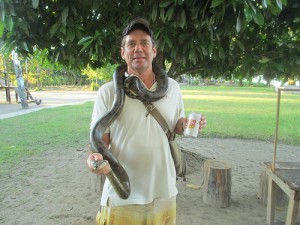 the author with beer in hand and snake around neck...